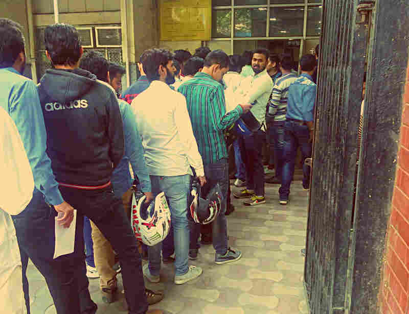 People At RTO Submitting Forms Required To Sell Company Car 