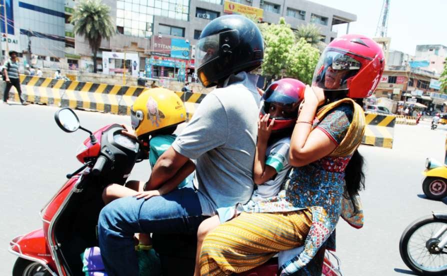 fine for not wearing a helmet while driving a two-wheeler