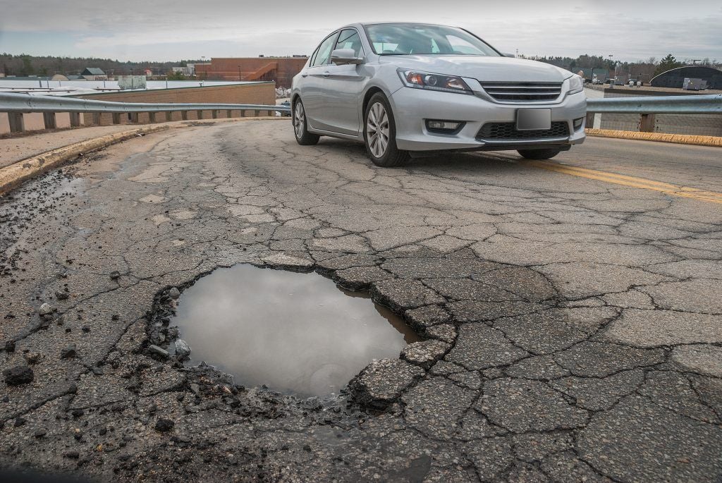 How Potholes Can Damage Your Car And How To Avoid Them